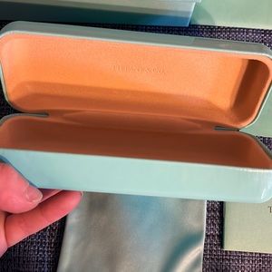 Tiffany and Co eyeglass case with cleaning cloth and baggie.